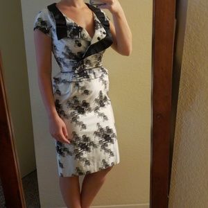 Black and white peplum v neck dress